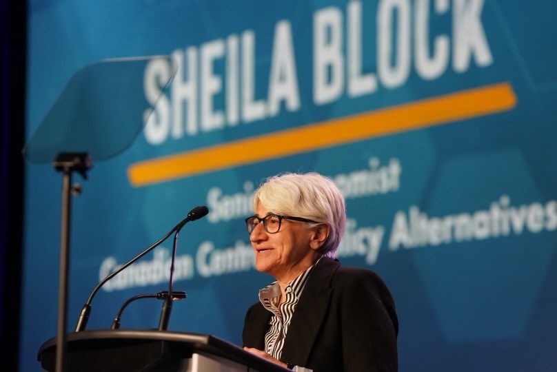 Sheila Block at the podium at the USW National Policy Conference